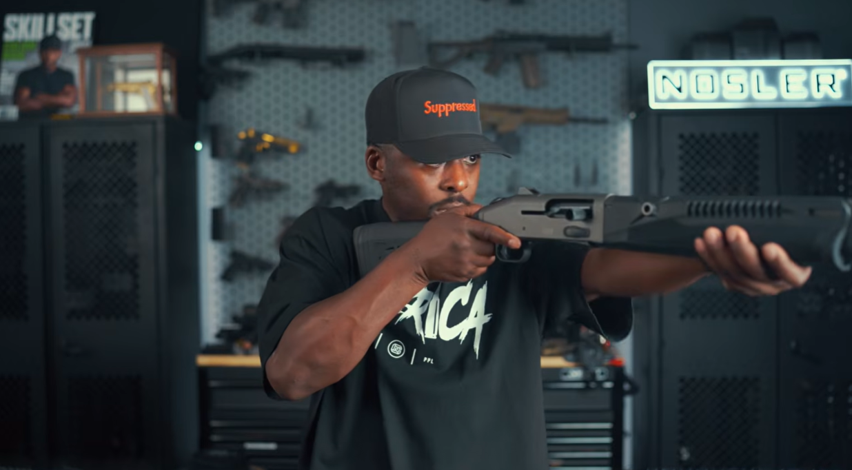 Colion Noir shouldering Mossberg 990 SPX