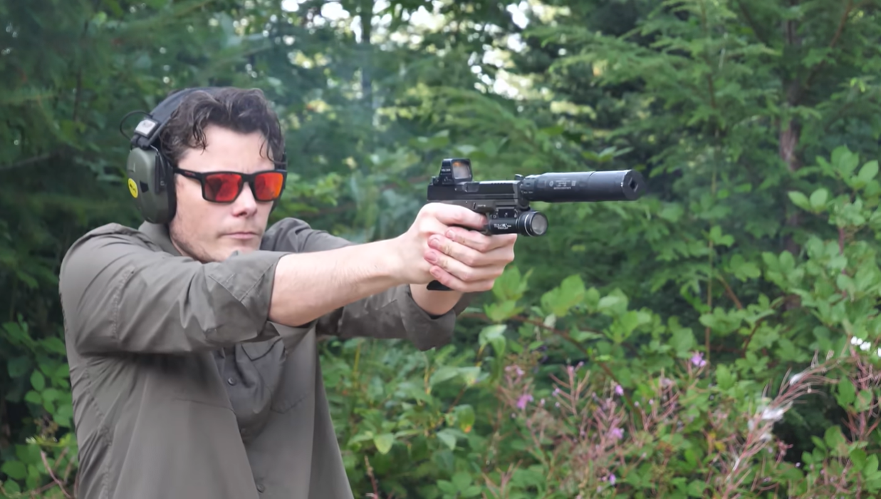 Suppressed pistol with titanium suppressor